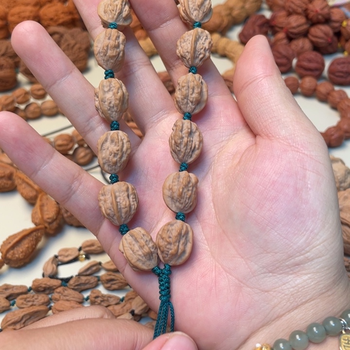 辉***腾吊坠文玩核桃文玩手串