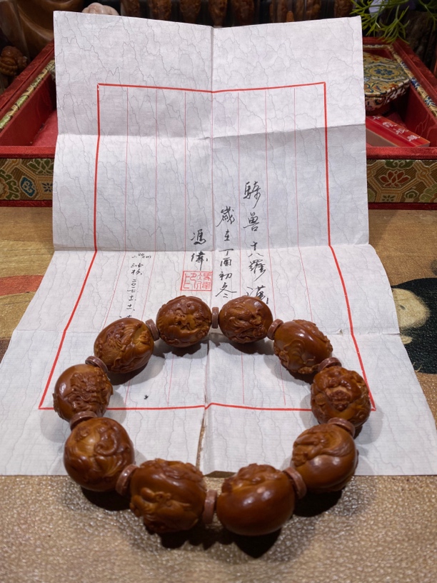 橄榄核骑兽十八罗汉，2.4×2.6三花油核冯伟本工