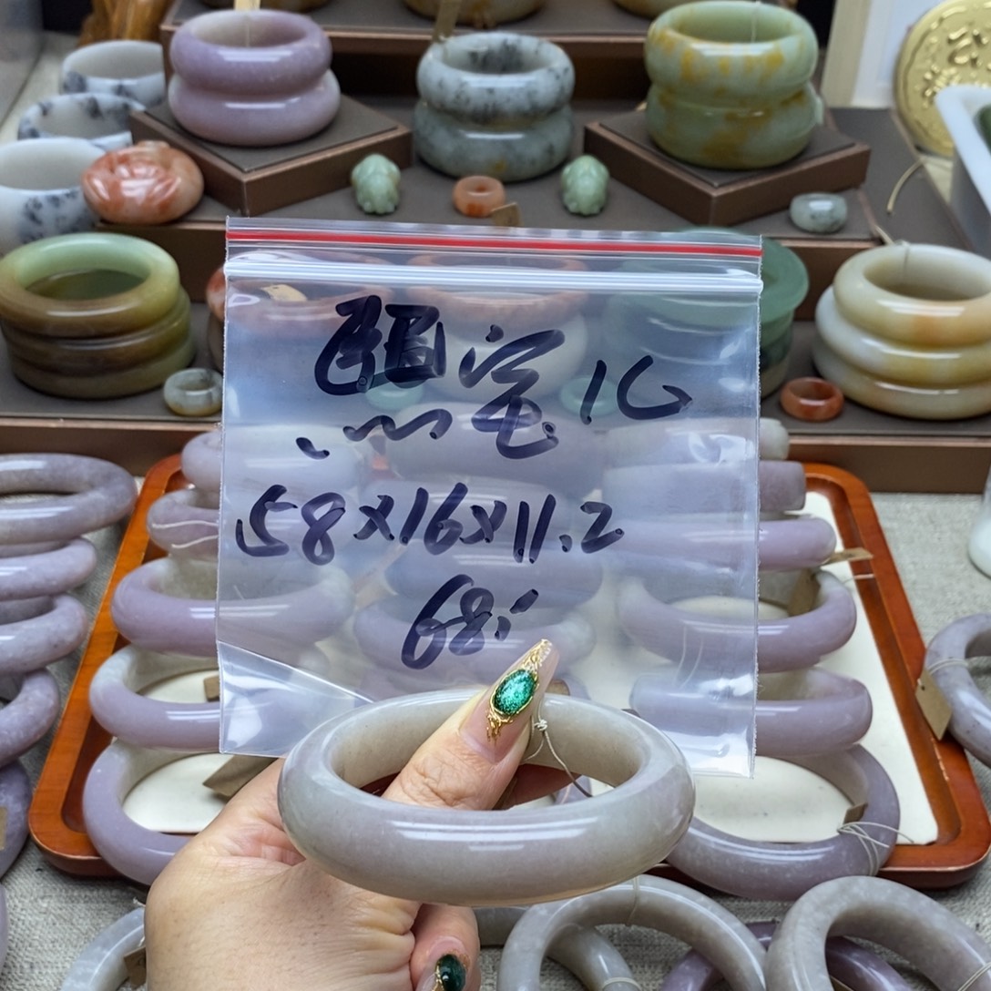 熙***儿石英岩玉合金手镯