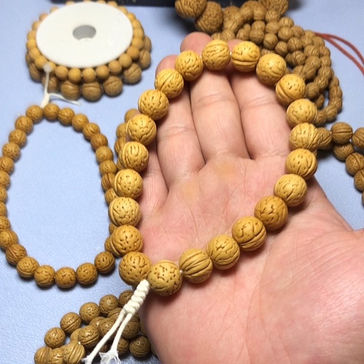 桃核吊坠h*h野生麒麟纹金豆手持