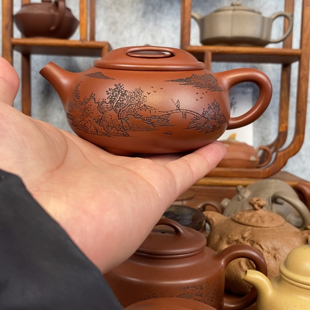 紫砂茶壶砂性小红泥牛盖石瓢