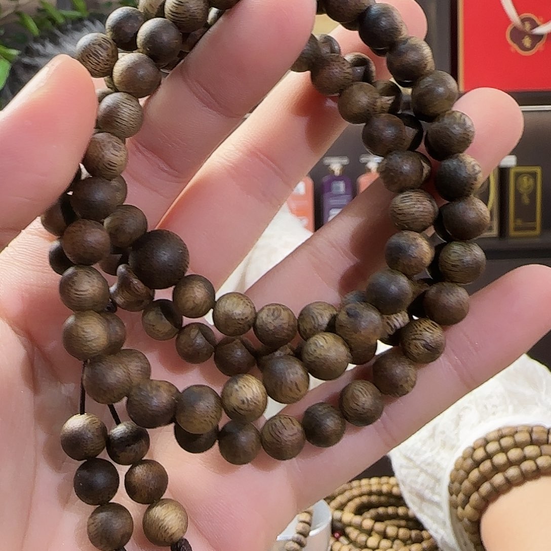 沉香手串张勺子卡7圆珠多圈