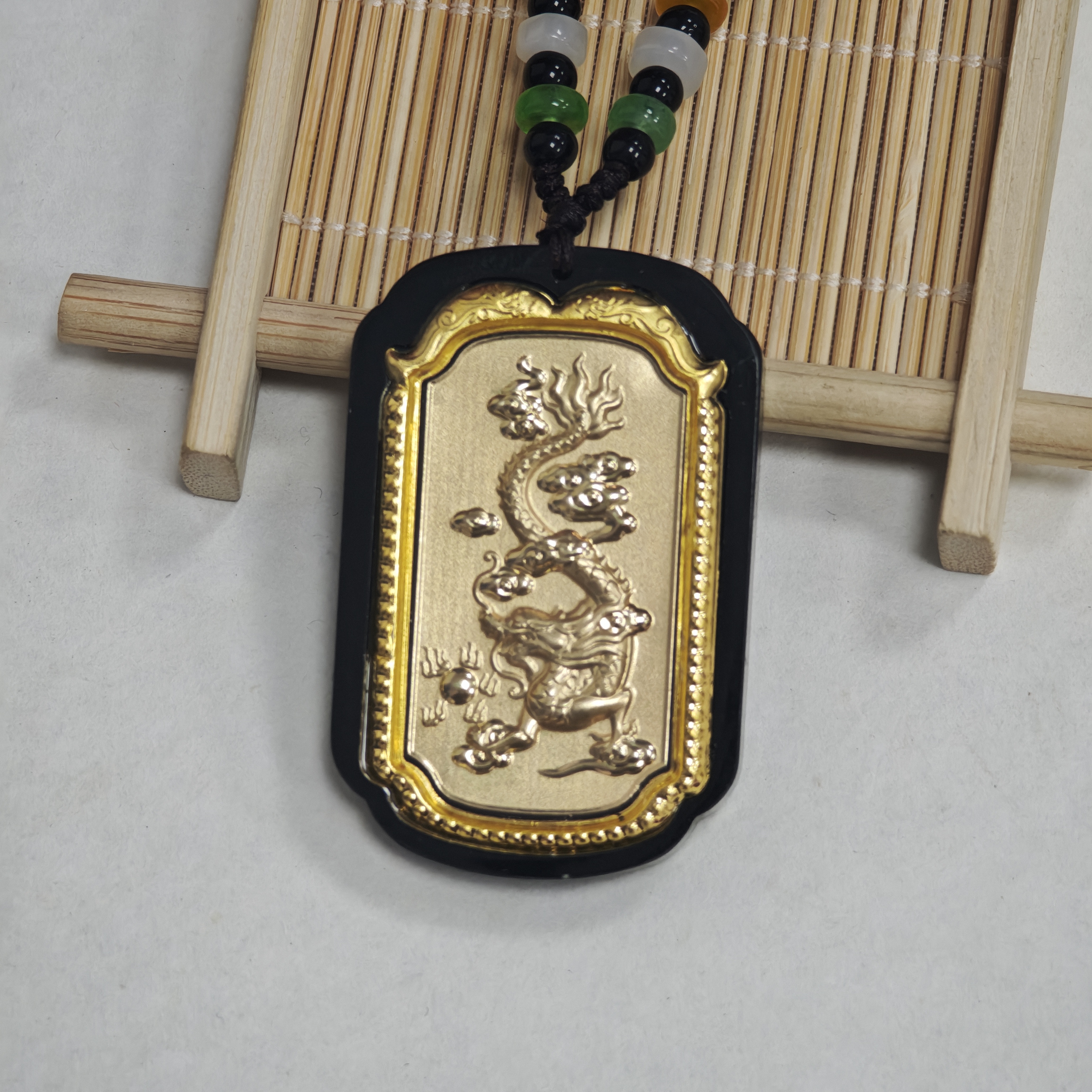 盛世典藏甄选和田玉龙牌吊坠