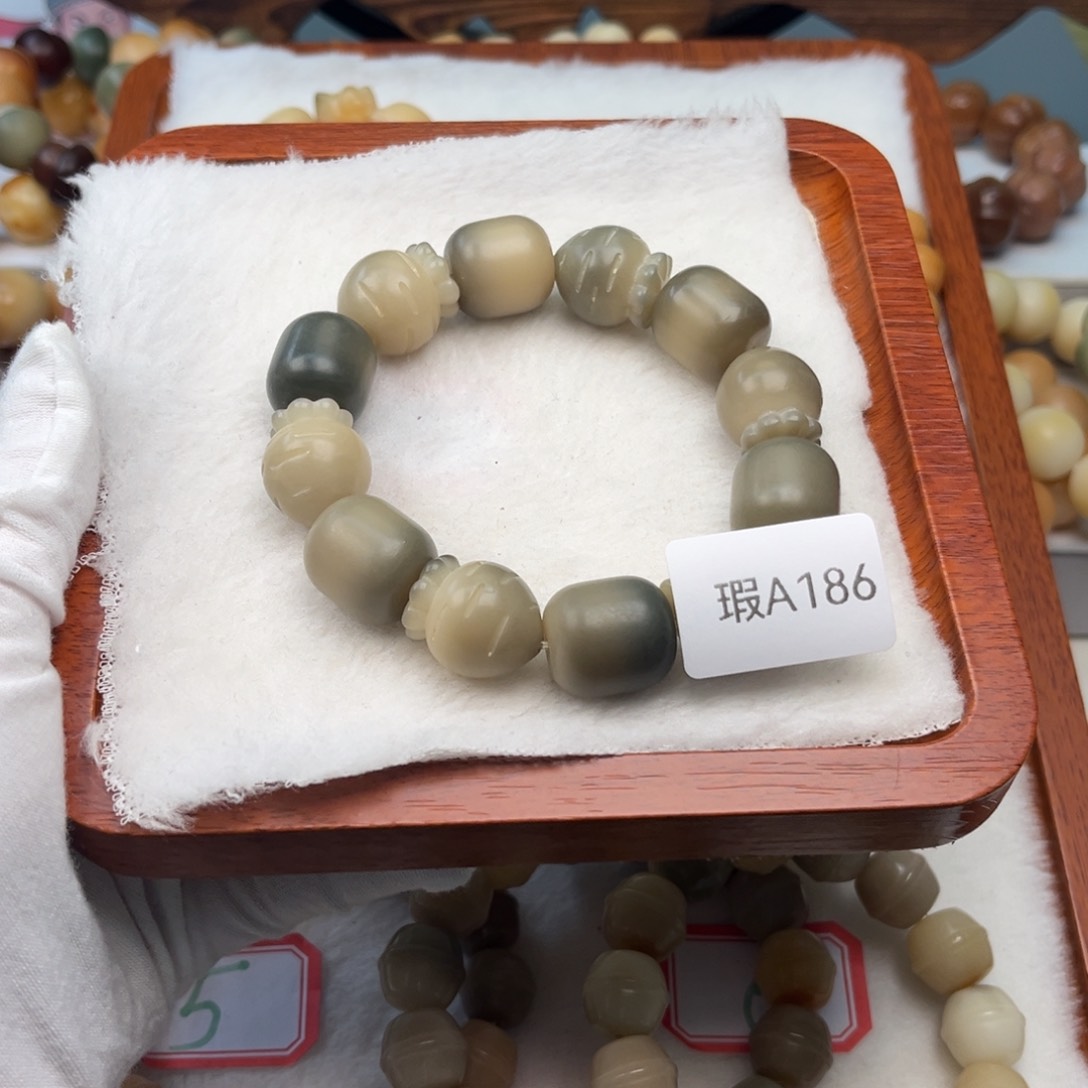 菩提根/象牙果手串小****?瑕A186萝卜15mm一串