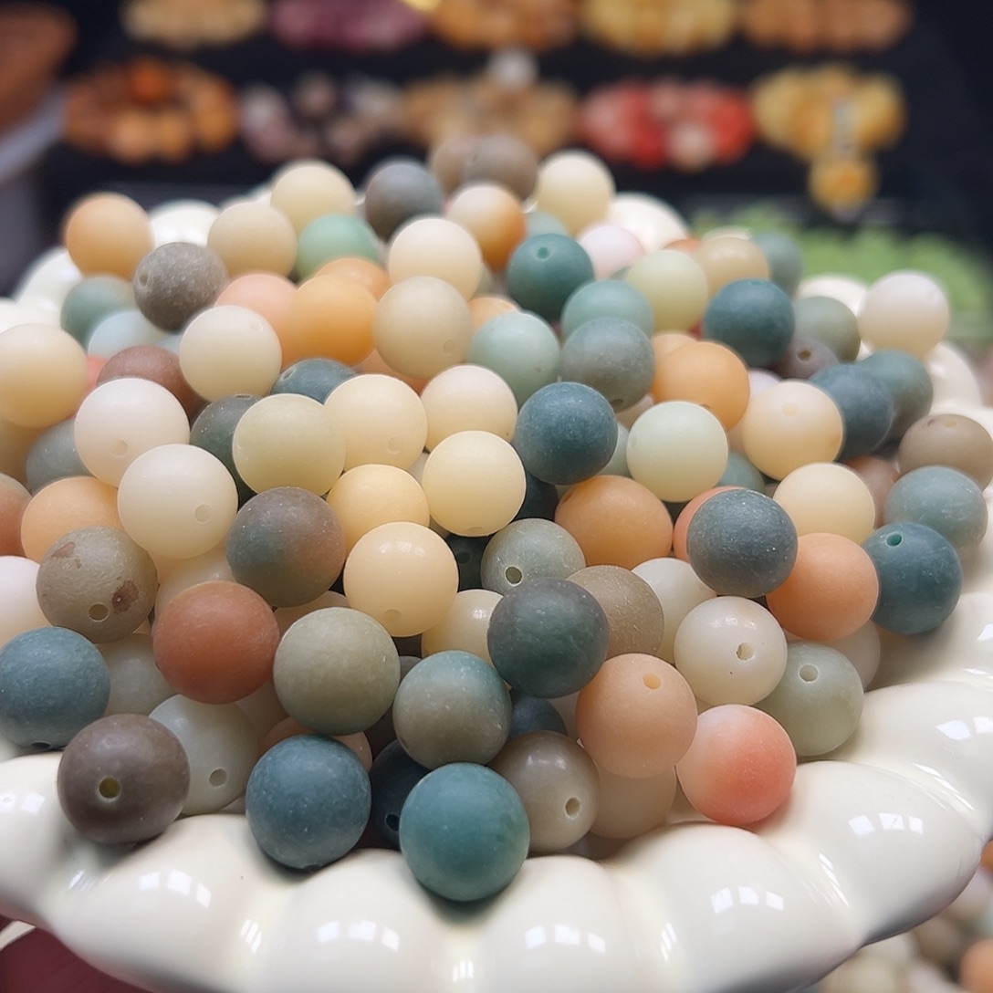 菩提根/象牙果手串微瑕卡12左右多宝磨砂圆500颗有不通孔的