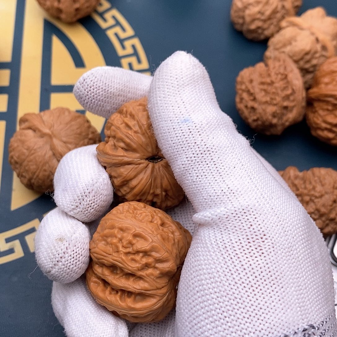 文玩核桃把件孫**_元宝