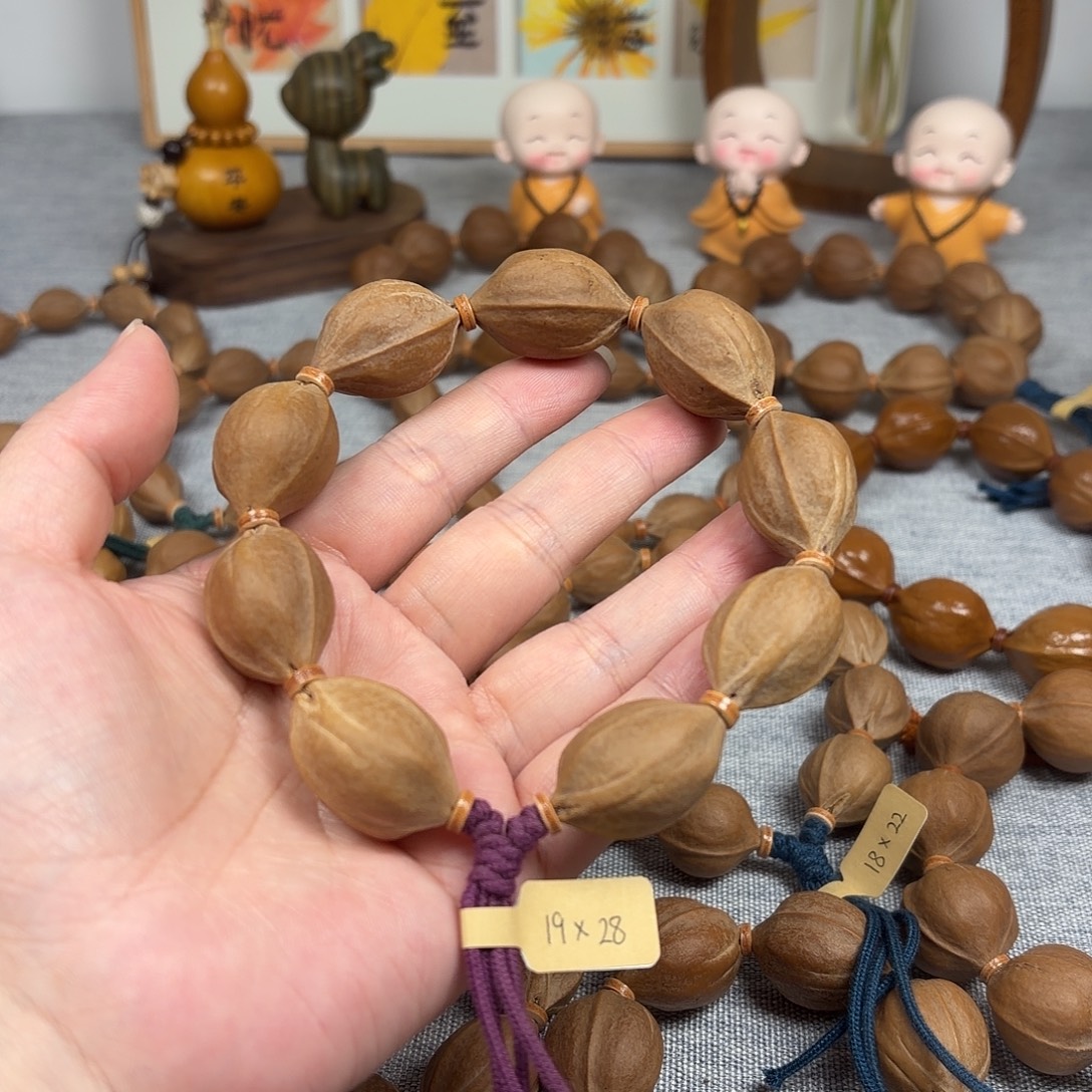 奶***甜橄榄核手串梅林铁核19.28橄榄核