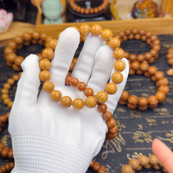 宠***狂手串桃核11尺寸小金豆