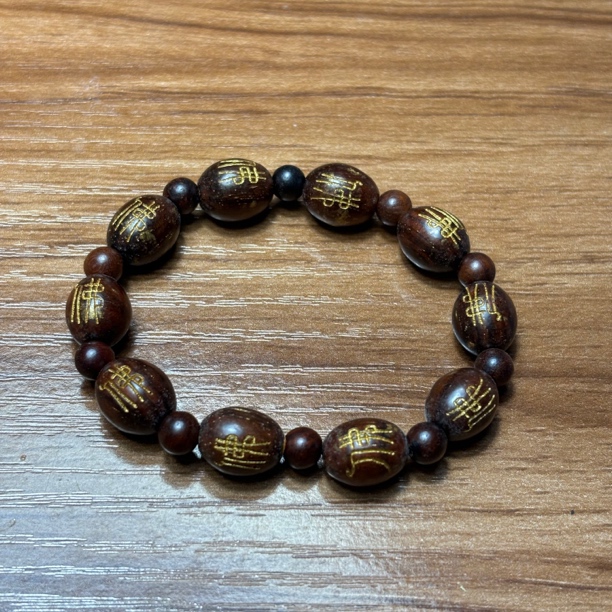 92紫檀1.0枣珠雕刻手串