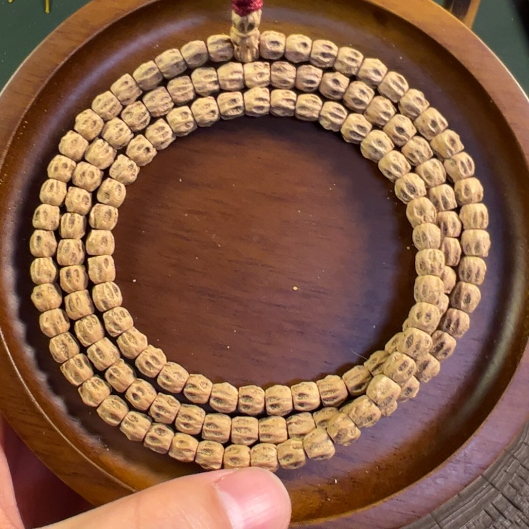 【闪购商品】柏香籽/百香籽吊坠热振双坑对眼狮驼林5号