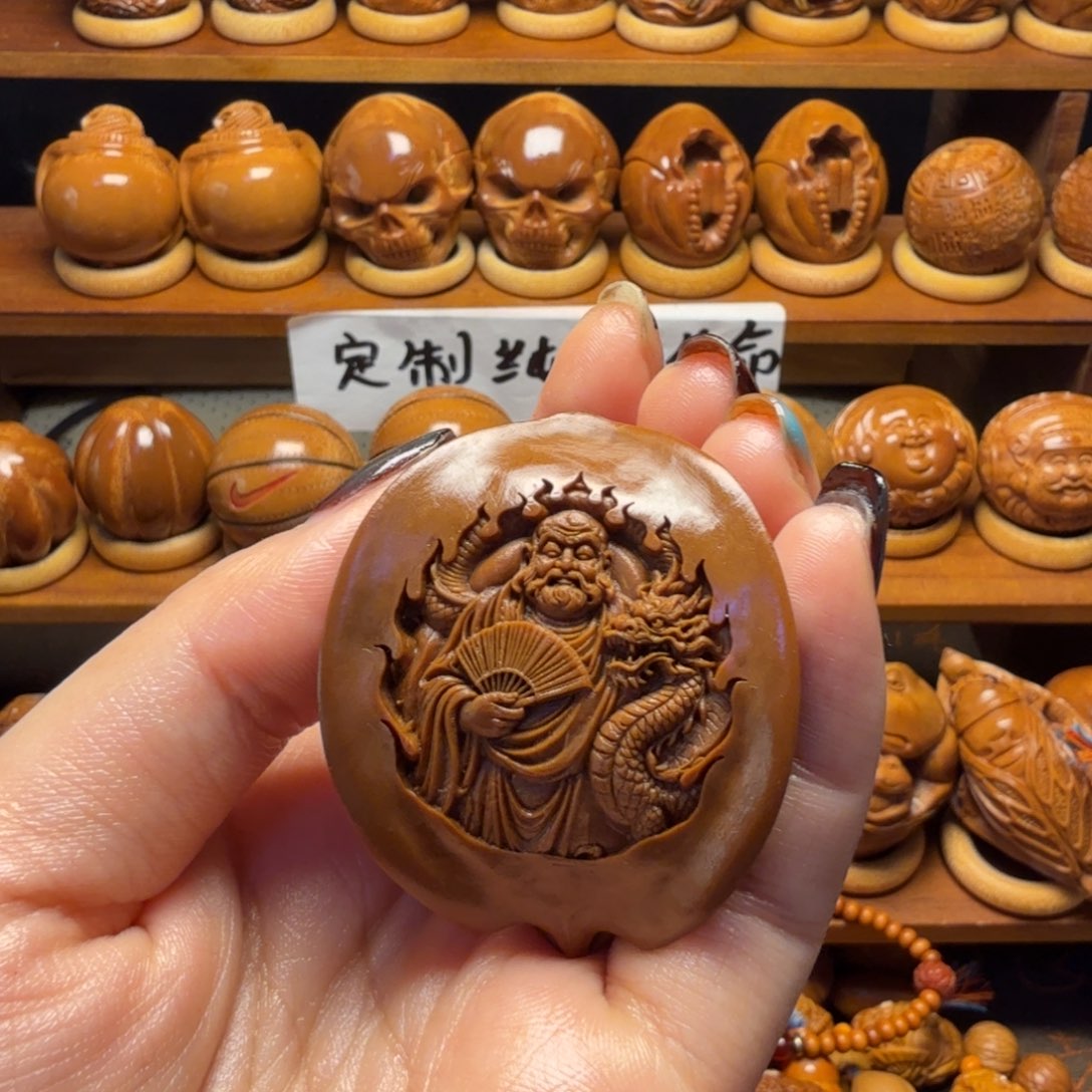 西***）把件橄榄核达摩三角