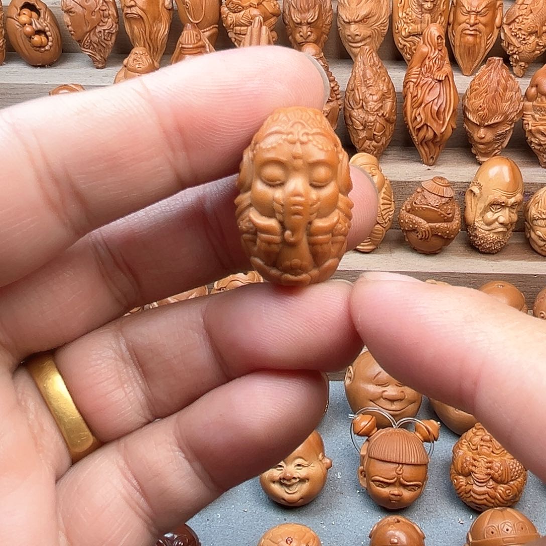 橄榄核吊坠18象宝宝