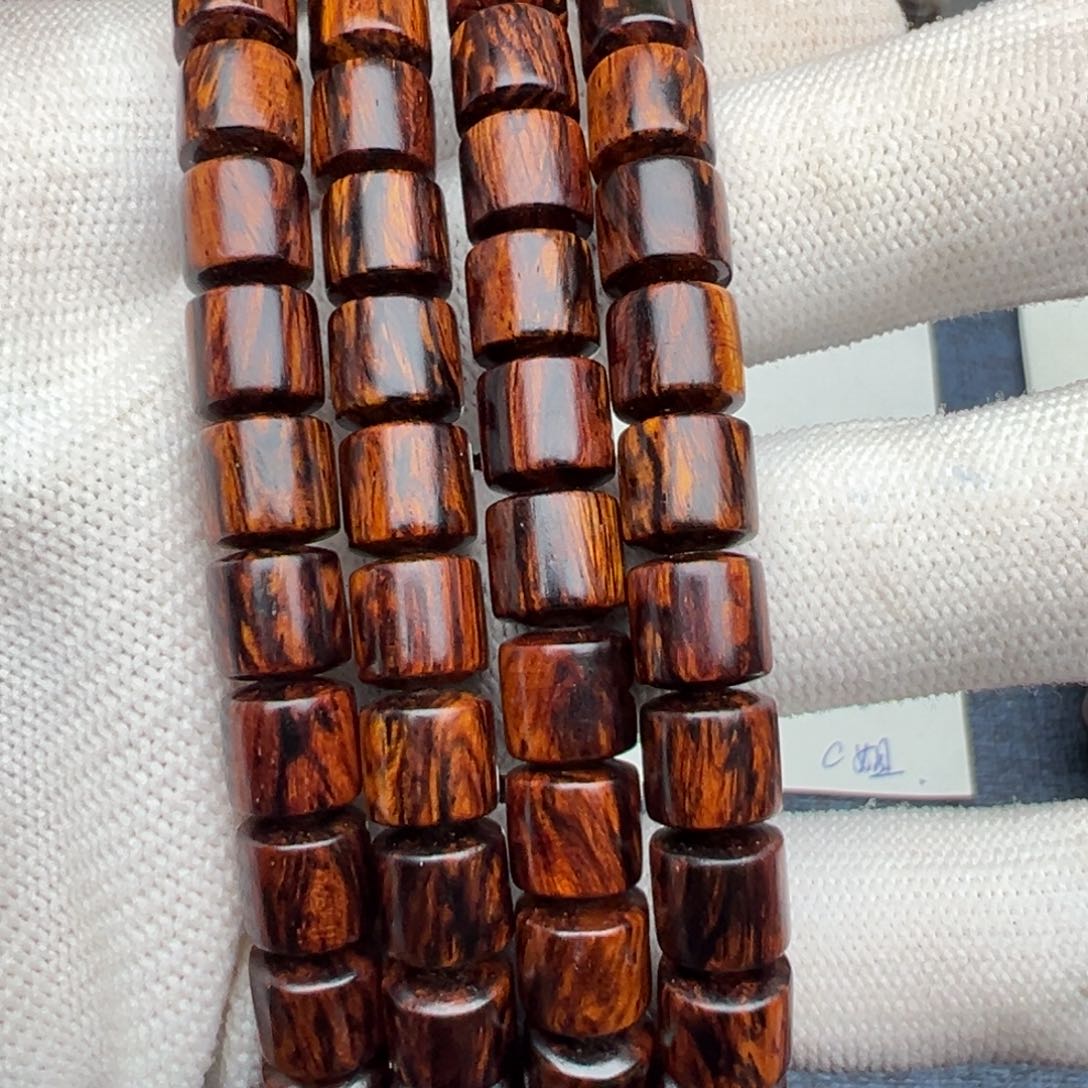 木b***t海南红降花梨公8×8桶珠超超一档黑金满火焰纹