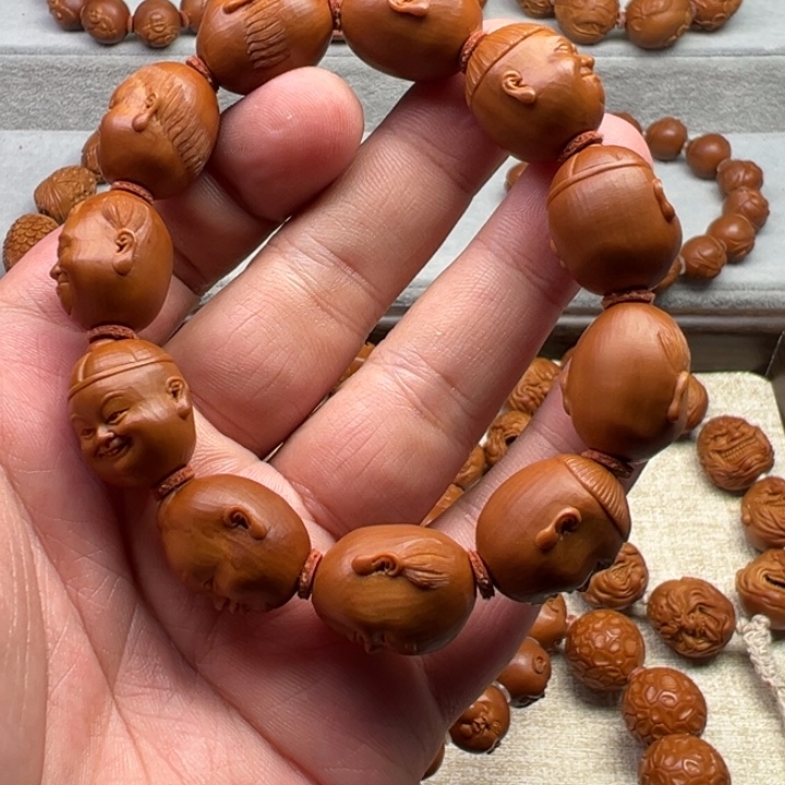 汪***油橄榄核手串橄榄核雕工艺制作