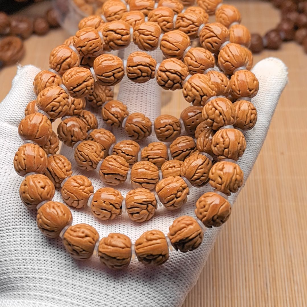 桃核吊坠肉纹大肠手串