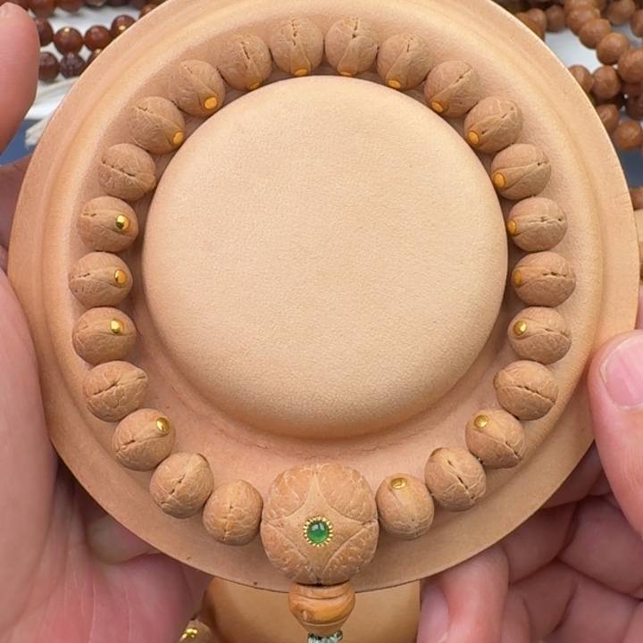 凤眼菩提手串9.7-10溜圆实心籽金钉