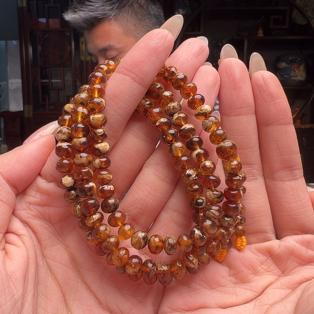 琥珀裸石未镶嵌抚顺琥珀20130。6mm