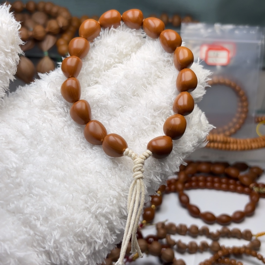 ****行橄榄核吊坠1.25随行