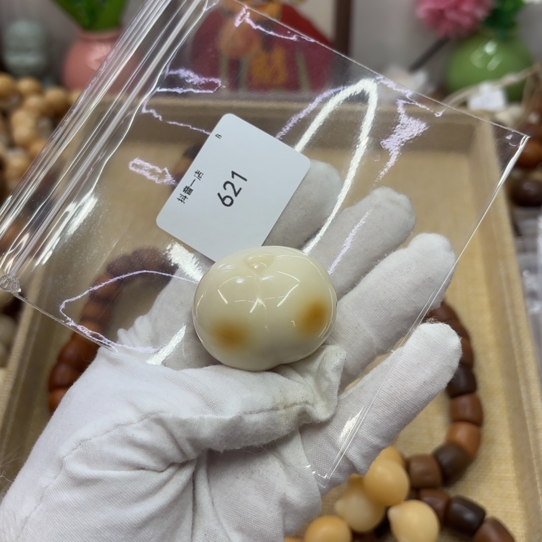 吊坠菩提根/象牙果牙果机抛柯基把件