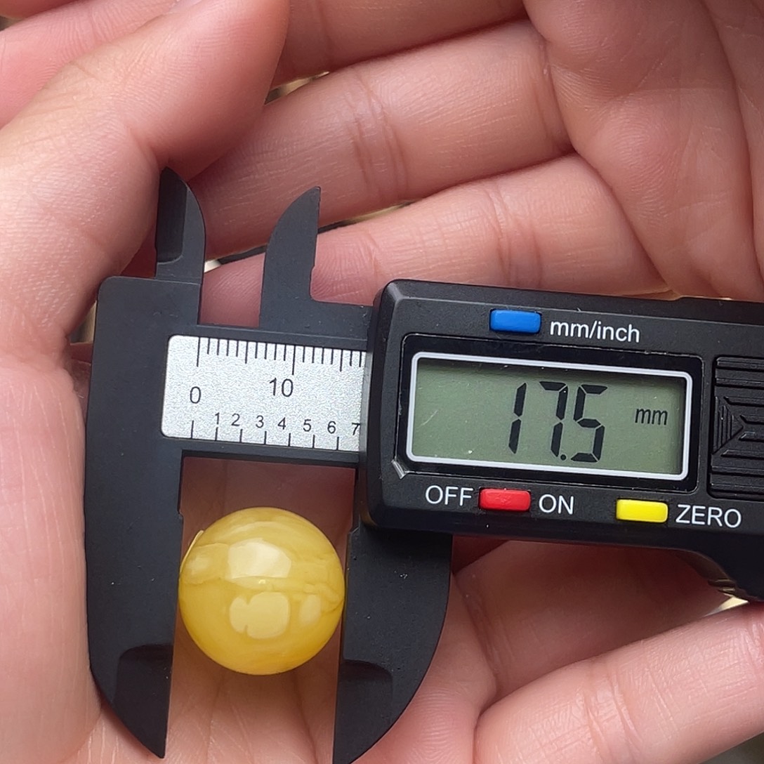 陈***彤琥珀未镶嵌裸石蜜蜡圆珠梦微瑕