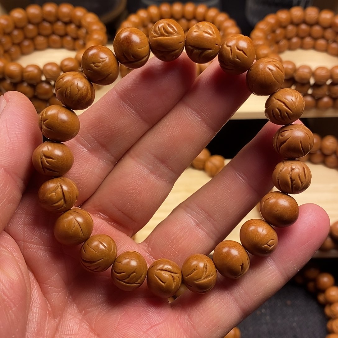 桃核手串龙纹苹果