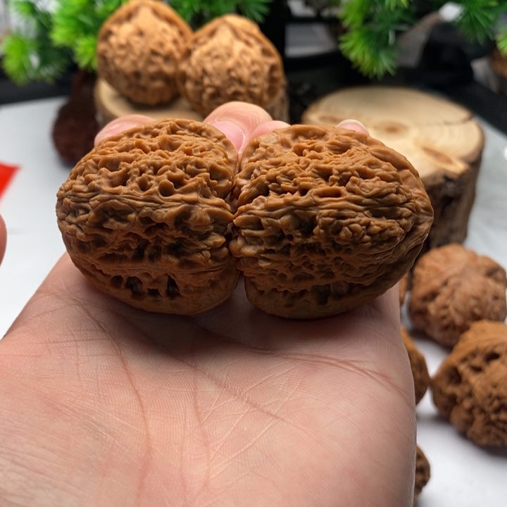 文玩核桃把件40全品三角疆