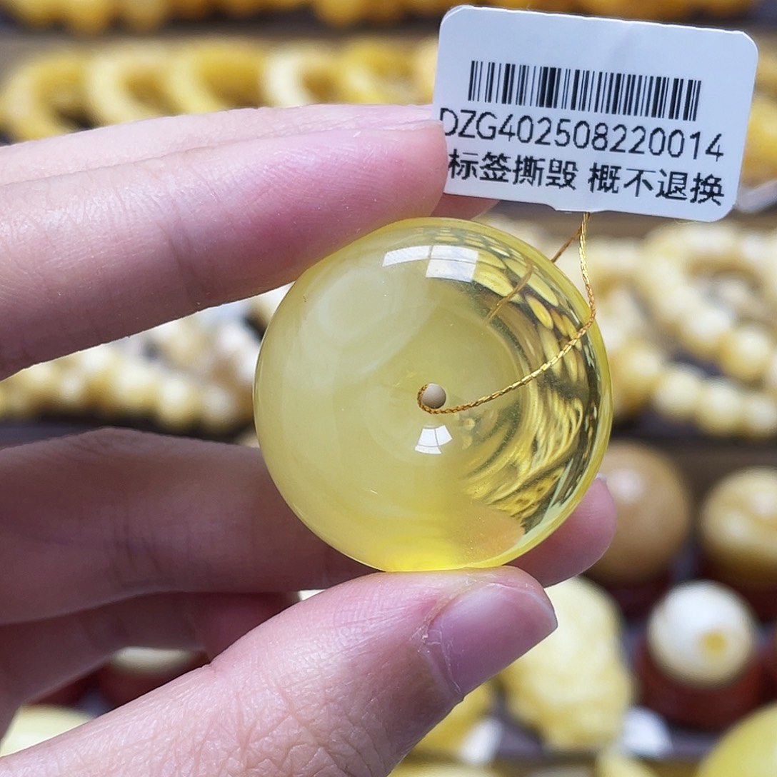 裸石琥珀未镶嵌28.6*13.9mm荧光扣子