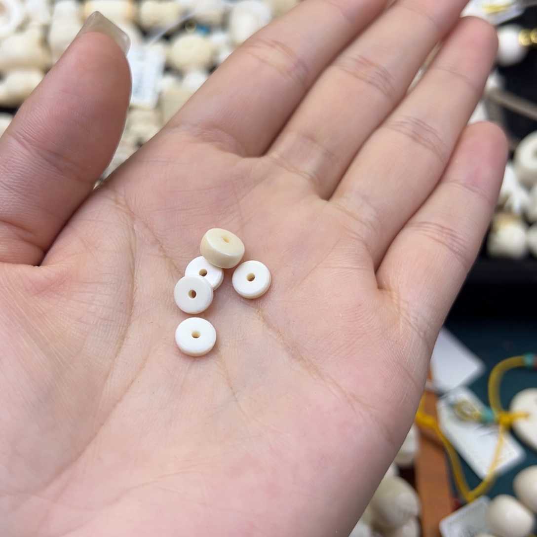 阳***仔吊坠猛犸象牙6.6mm药片