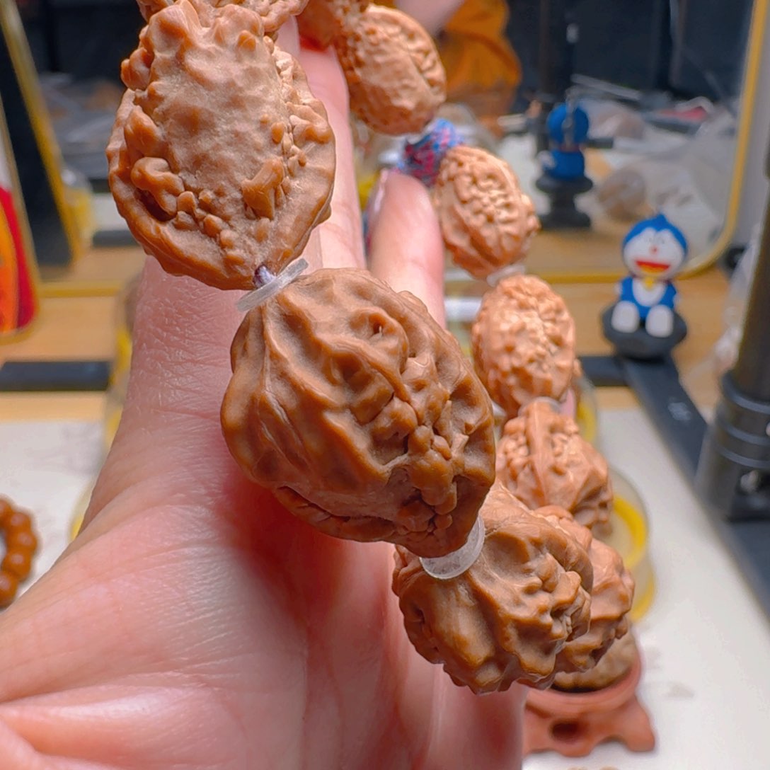 核桃把件麒麟角串