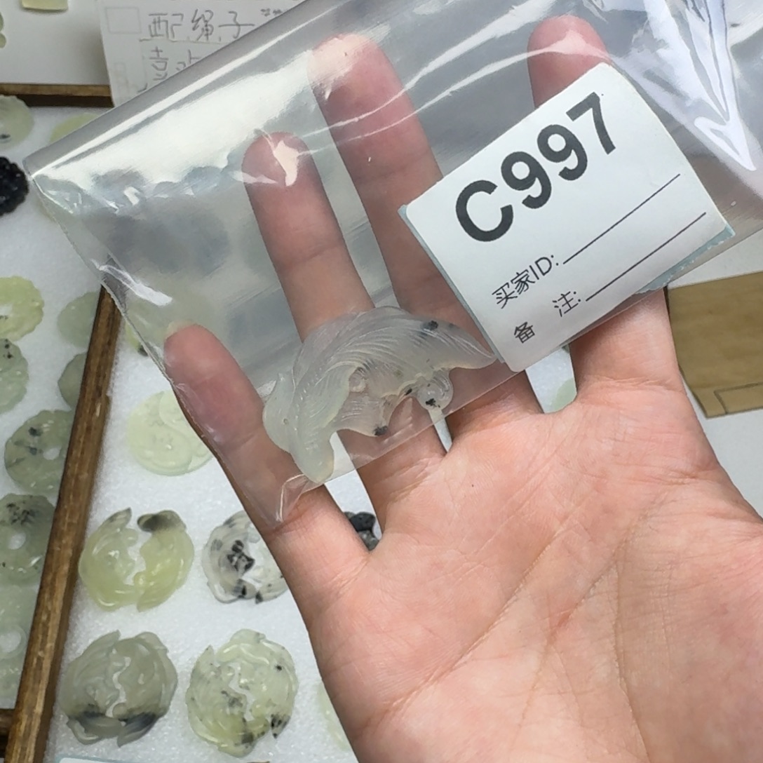拖***拖蛇纹石玉未镶嵌吊坠