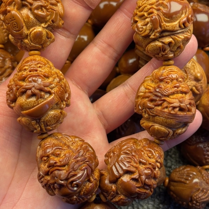 橄榄核吊坠゛****つ橄榄核手持