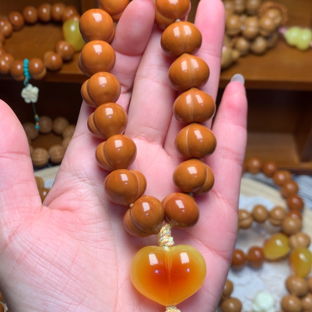 把件猴头核桃15玻璃底屁桃手持爱心