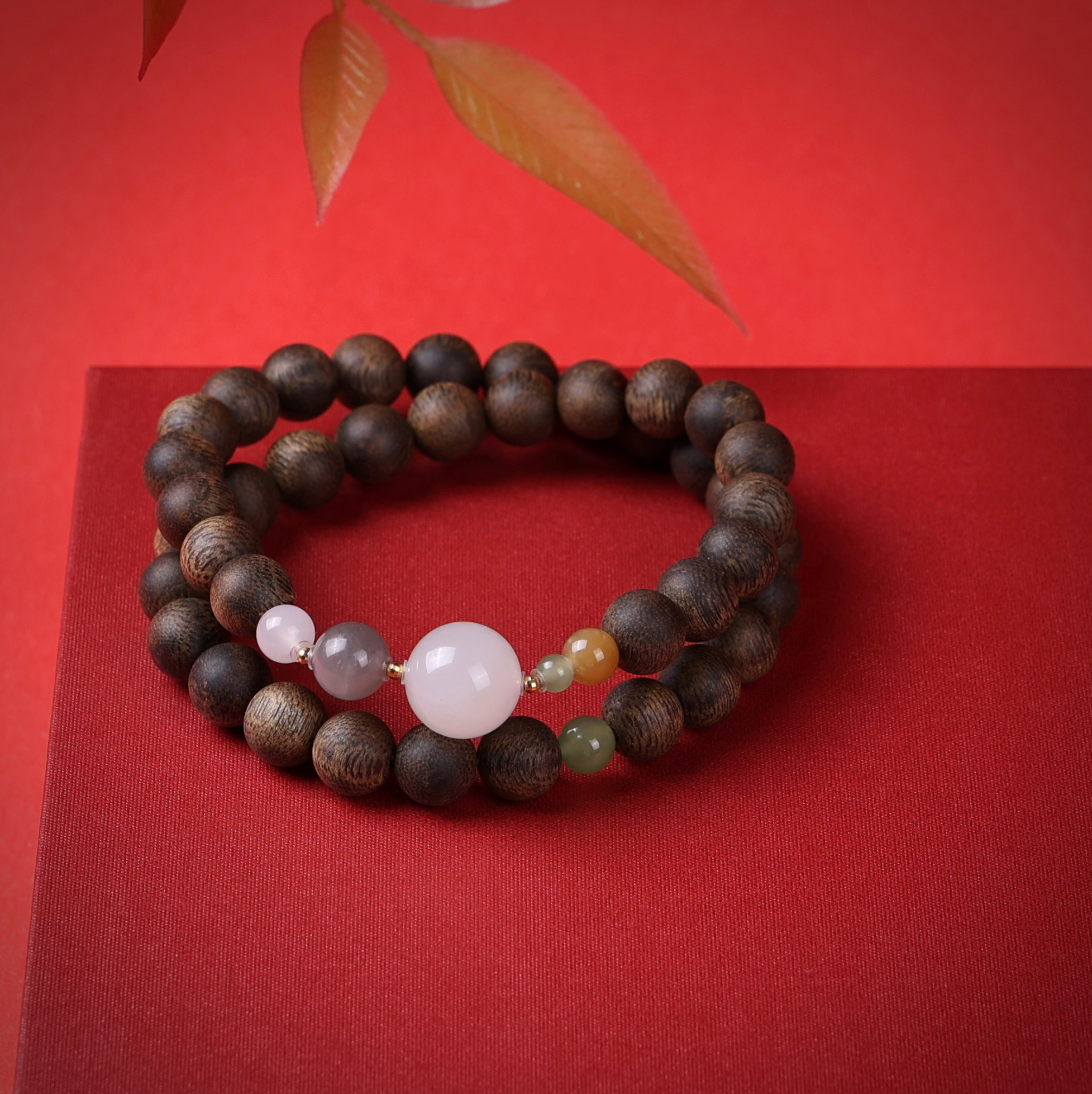 沉香【重华岁贡】--沉水越南芽庄玉化白棋楠0.8双圈设计款LL