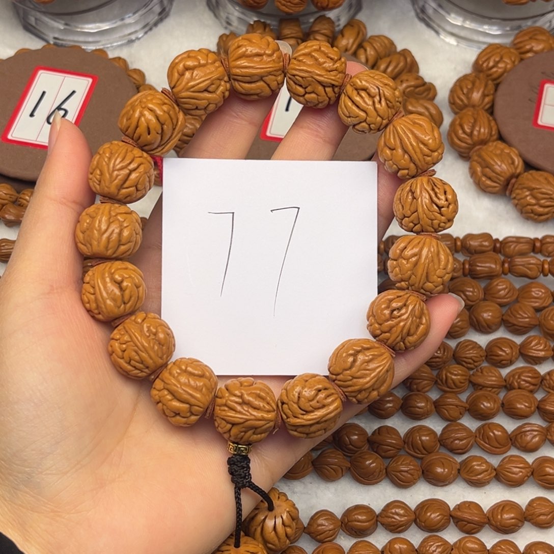 核桃龙纹桃核手持肚卡17霸王龙