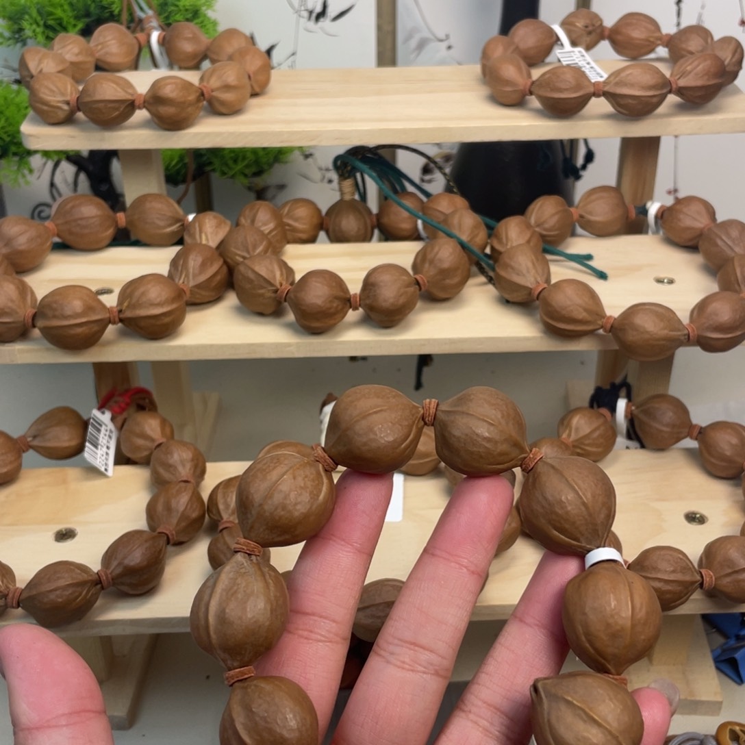 墨***_手串/手链橄榄核22*26梅林铁核