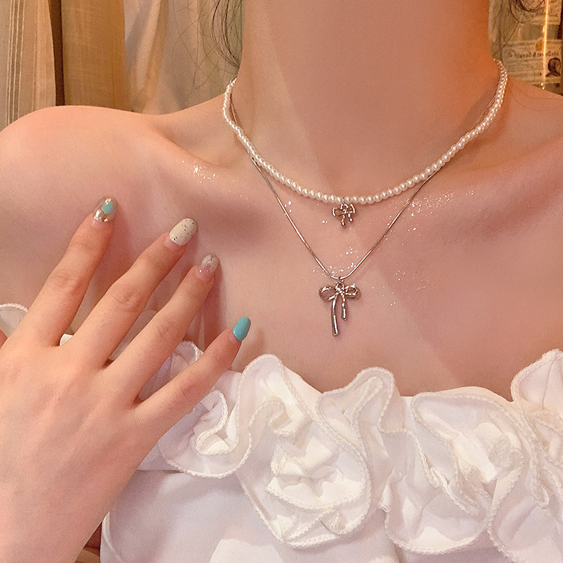 钛钢仿珍珠项链 韩系温柔甜美气质双层叠戴蝴蝶结珍珠锁骨链颈链