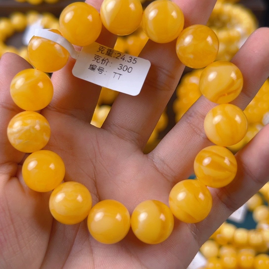琥珀未镶嵌手串24.35g焦皮同料圆珠14mm tt