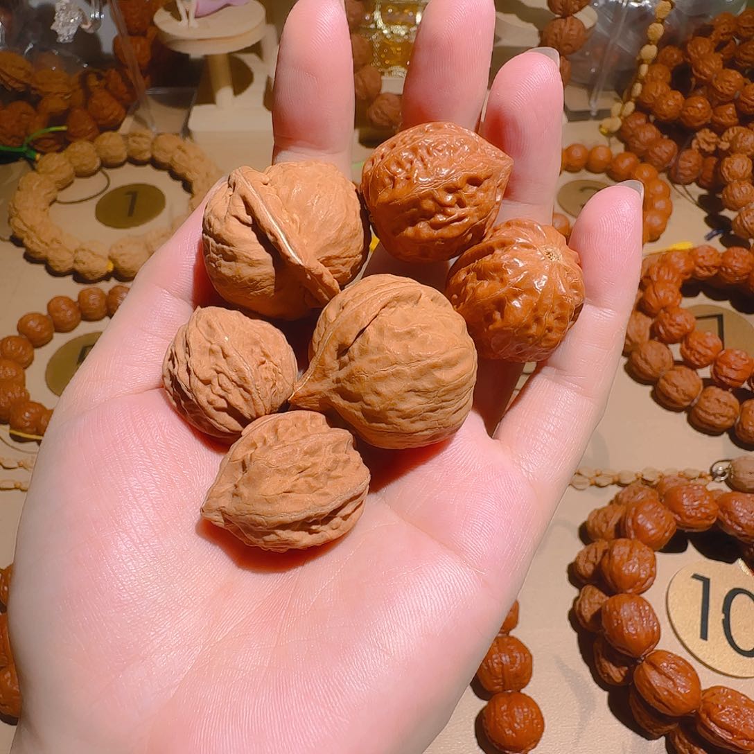 文玩核桃吊坠元宝+珊瑚+八棱手捻