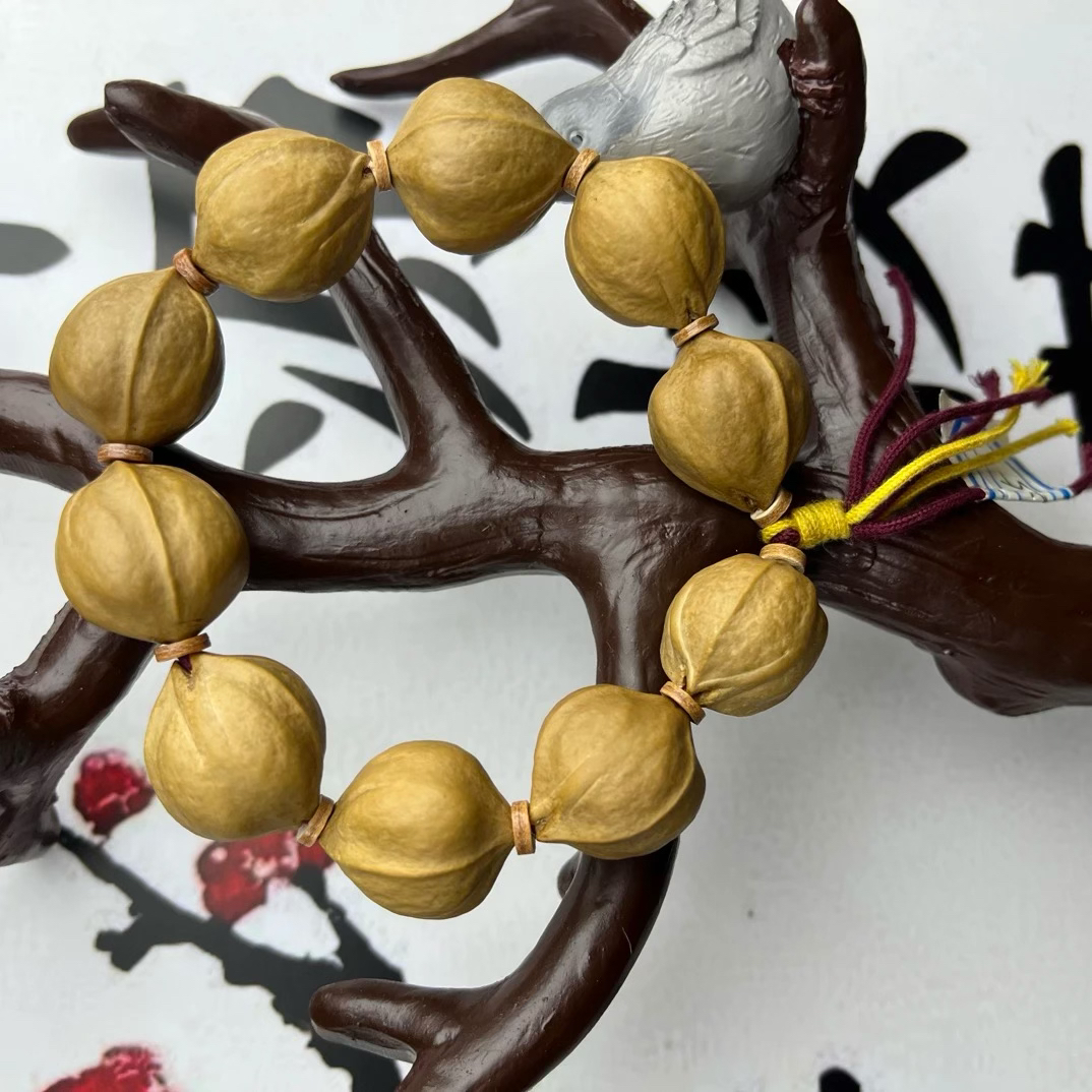 21-25梅林老树铁核橄榄核文玩正圆光珠原皮素核
