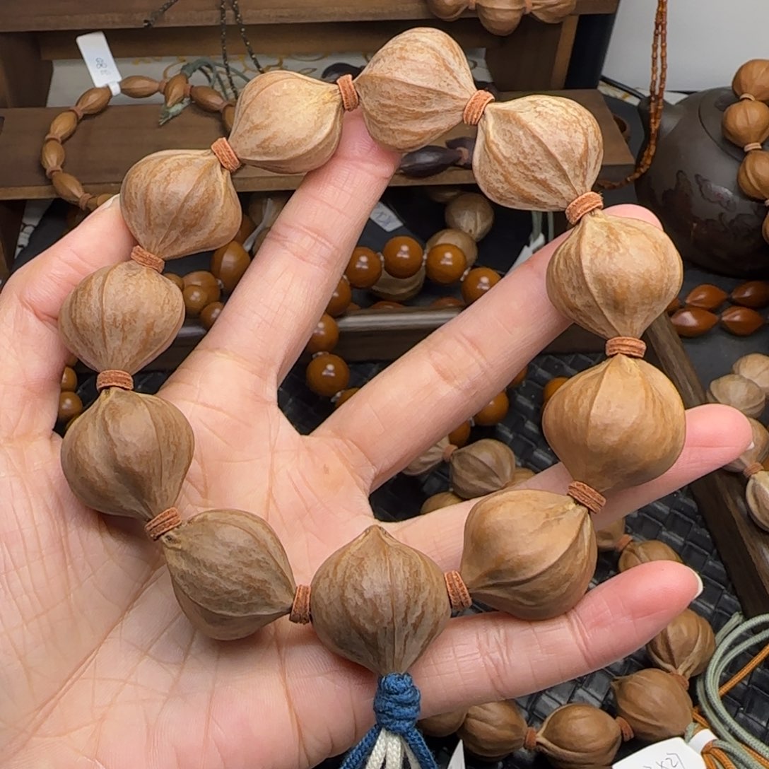 手串橄榄核02。2.4*2.6四花