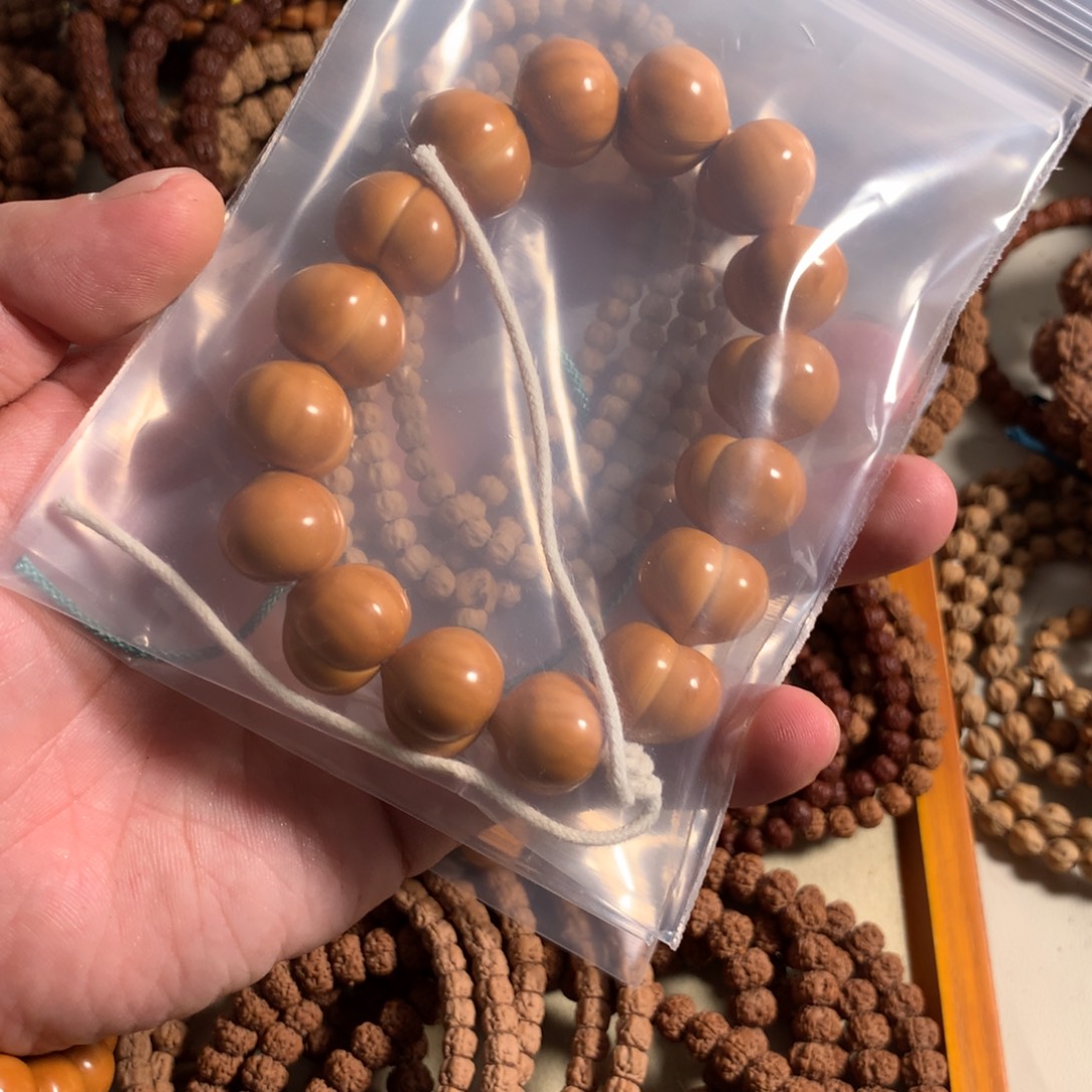 小***树柏香籽/百香籽吊坠梅花