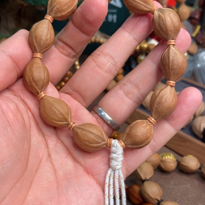 橄榄核手串笑**穷哈哈哈