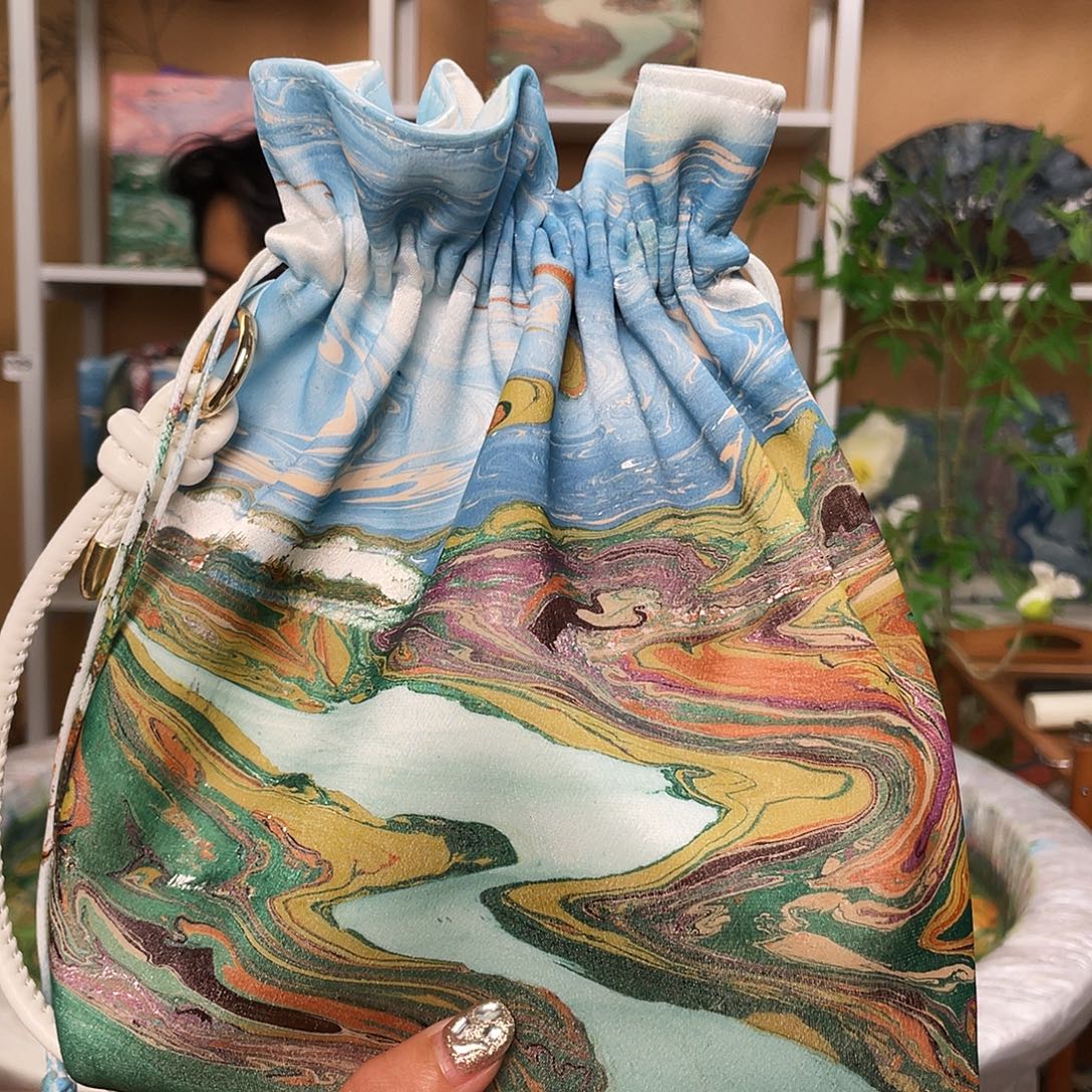 哈***哈扇子大漆包包福袋包包