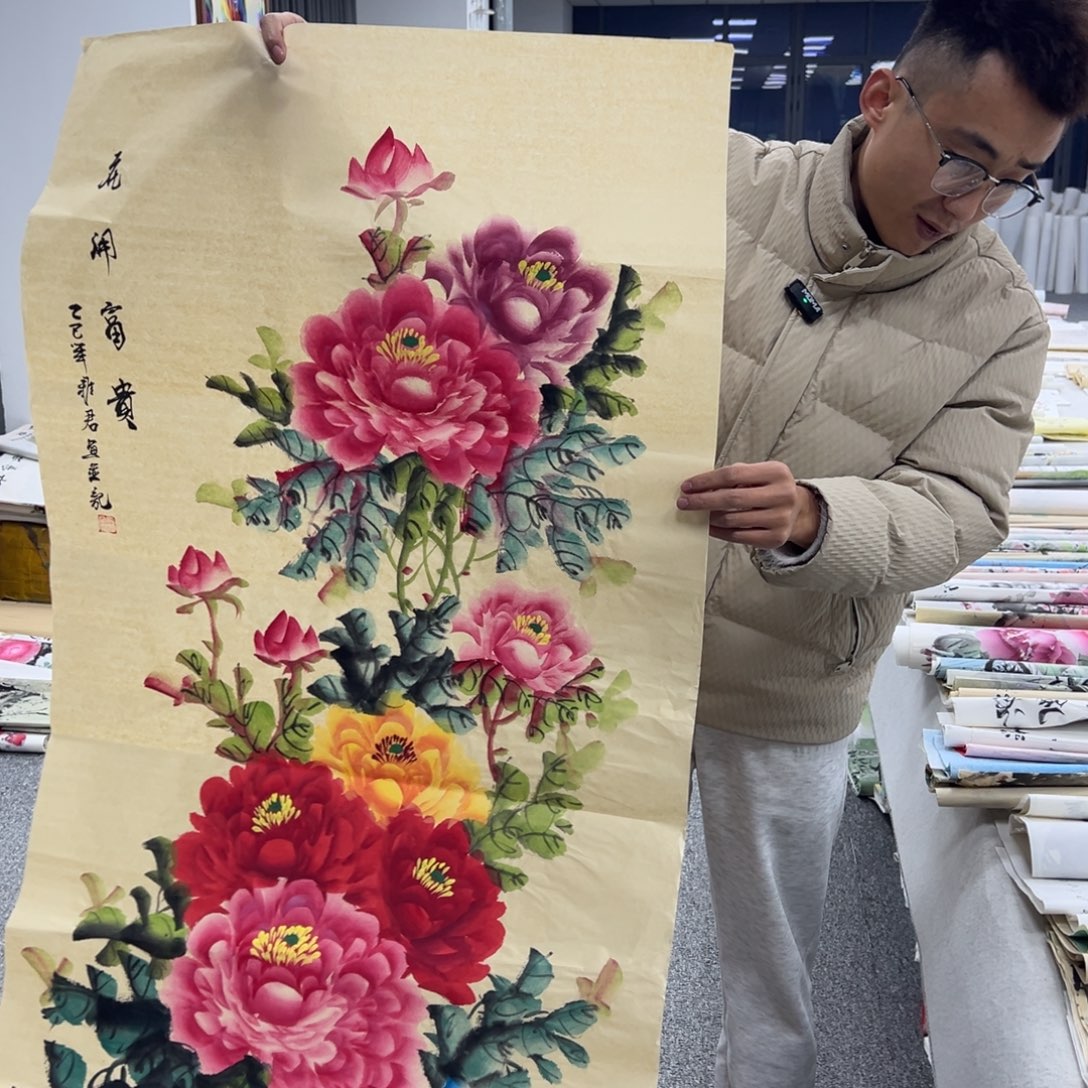 国画卖字画的小男孩
