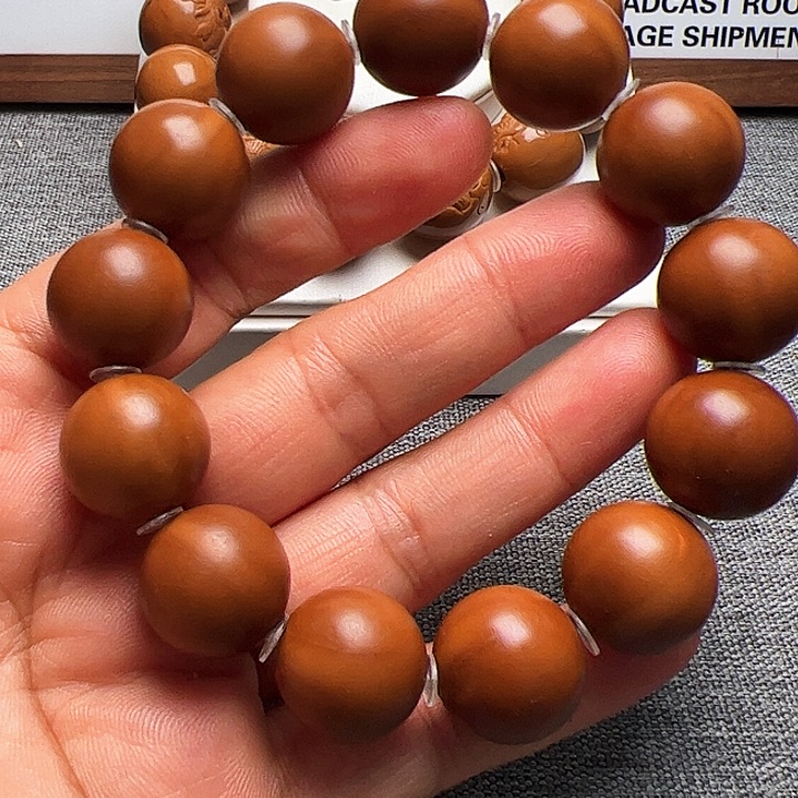 橄榄核手串/手链一**鱼正圆光珠