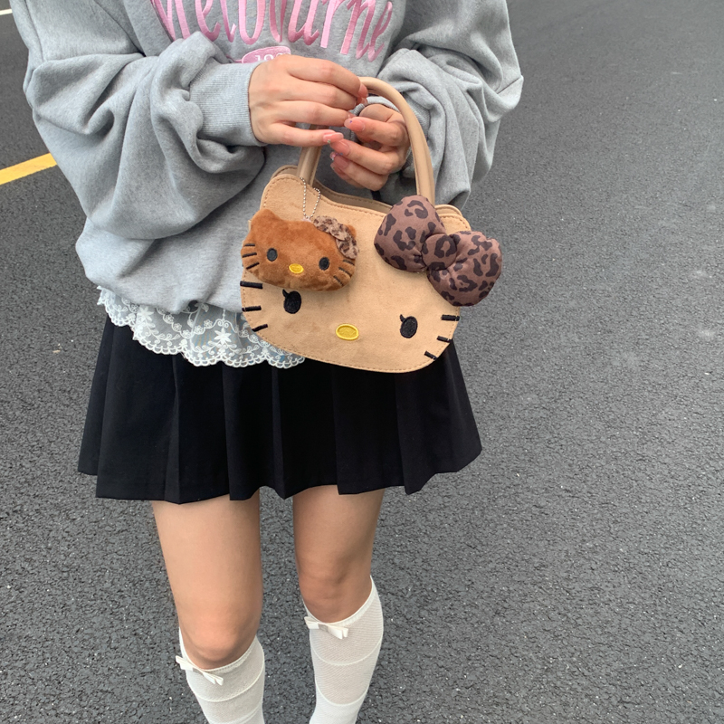 （淘气包）hello Kitty磨砂黑皮手提斜挎包