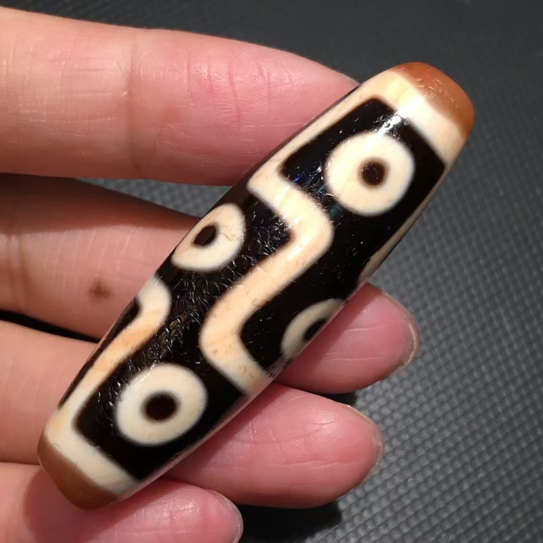 超顶工-纯手工老料朱砂九眼天珠 尺寸约51x12mm