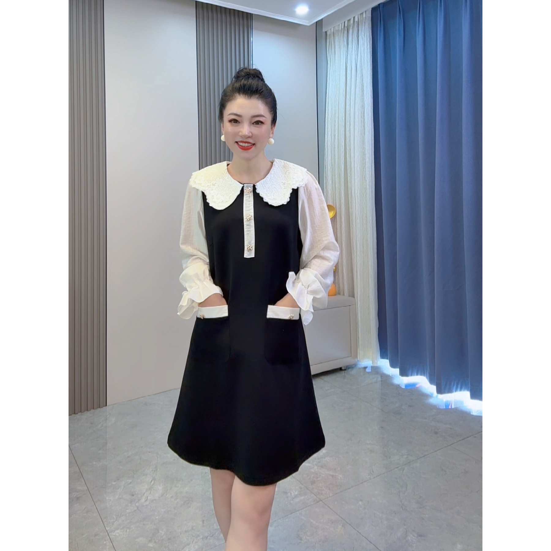 轻奢撞色假两件连衣裙女2025年秋季新款气质显瘦减龄娃娃领小黑裙