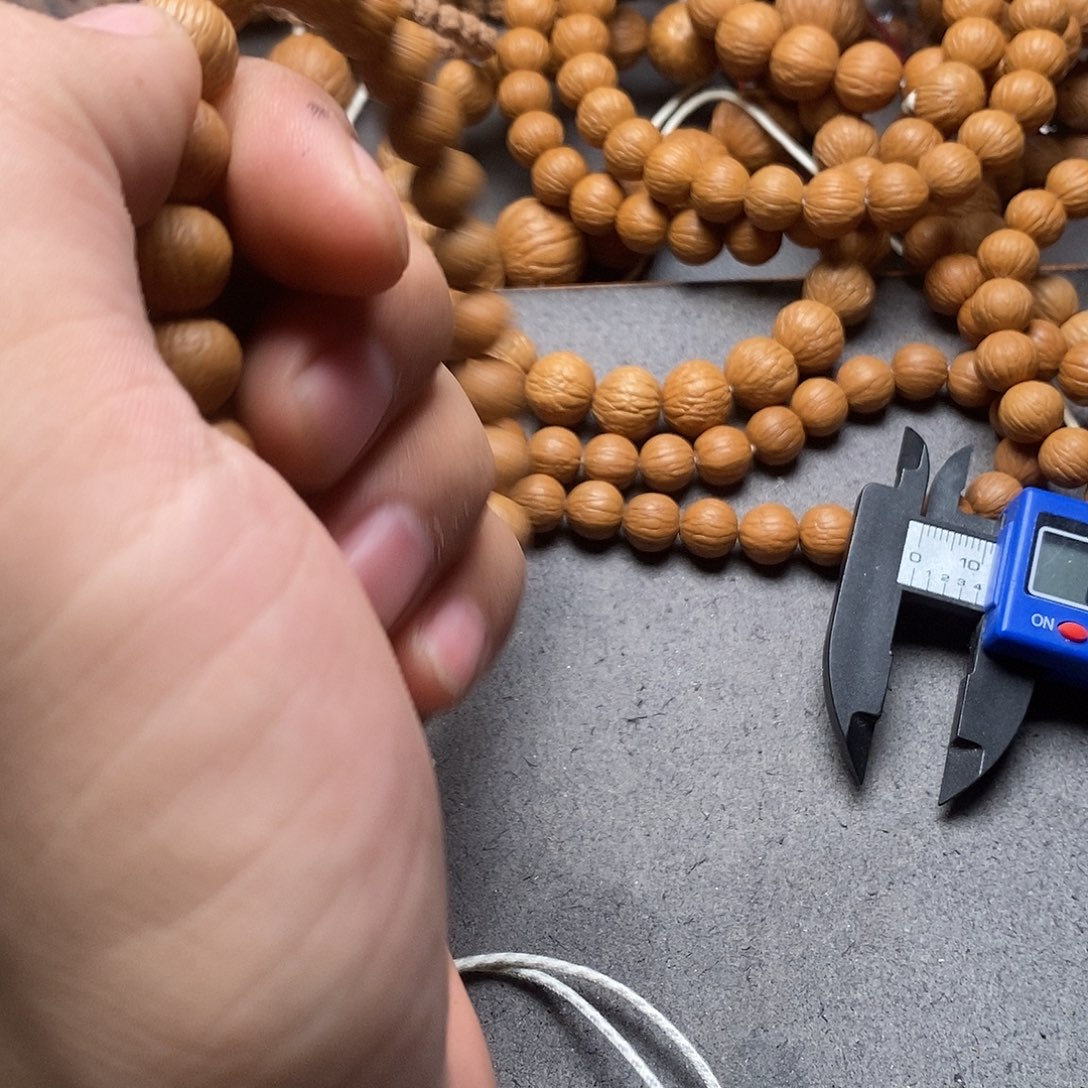 H***·吊坠猴头核桃凤羽0.2