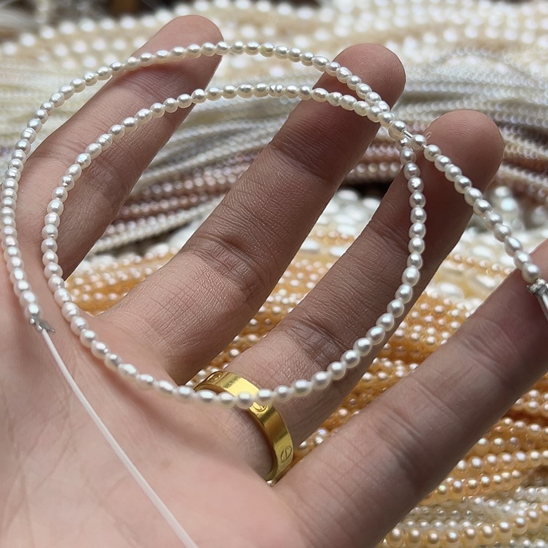 纠***结未镶嵌半成品淡水珍珠2.6米珠亮